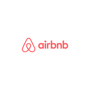 Airbnb logo featuring a red abstract symbol next to the word "airbnb" in lowercase red letters on a light gray background.