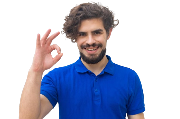 Man with curly hair and beard in a blue polo shirt smiles and makes an OK hand gesture against a plain white background.